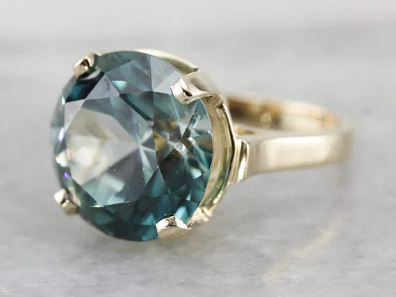Tourmaline Gemstone Rings in 18K Two - Tone Gold with a Floral - Shaped Setting for a Feminine TouchExceptional Blue Zircon Statement Ring, Museum Quality Gemstone Tourmaline Gemstone Rings in 18K Two - Tone Gold with a Floral - Shaped Setting for a Feminine TouchExceptional Blue Zircon Statement Ring, Museum Quality Gemstone