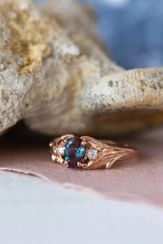 Men's Alexandrite Engagement Rings in Platinum with a Hidden Halo of DiamondsREADY TO SHIP: Wisteria ring in 18K rose gold, lab alexandrite pear cut 7x5 mm, accent moissanites, AVAILABLE RING SIZES: 7US