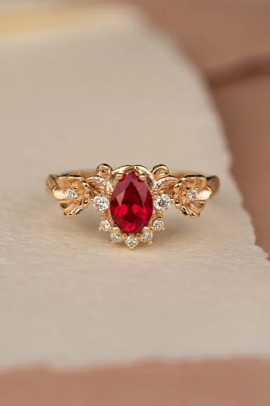 Men's Diamond Engagement Rings with Platinum Band and Halo Setting for a Luxury ProposalREADY TO SHIP: Adelina ring in 14K yellow gold, lab ruby pear cut 7x5 mm, lab grown diamonds, AVAILABLE RING SIZES: 5.5 - 8.5 US