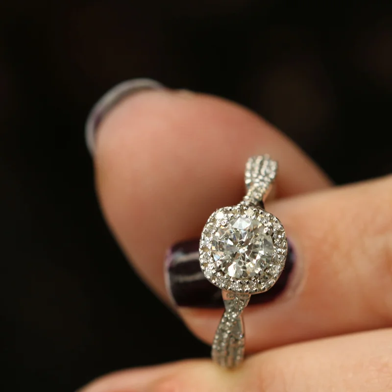Men's Tanzanite Engagement Rings in Palladium with a Three - Stone ArrangementSuriya Twisted Natural Round cut Diamond Engagement Ring