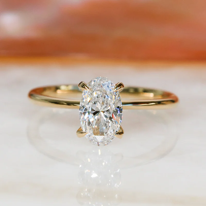 Men's Tanzanite Engagement Rings in Palladium with a Three - Stone ArrangementMoonlit Sky - 1 Carat Claw Prongs Natural Oval Cut Diamond Engagement Ring Men's Tanzanite Engagement Rings in Palladium with a Three - Stone ArrangementMoonlit Sky - 1 Carat Claw Prongs Natural Oval Cut Diamond Engagement Ring