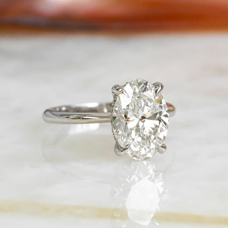 Men's Ruby Engagement Rings in Rose Gold with a Solitaire Design for a Romantic GestureMoonlite Sky Claw Prongs Natural Oval Diamond Engagement Ring Men's Ruby Engagement Rings in Rose Gold with a Solitaire Design for a Romantic GestureMoonlite Sky Claw Prongs Natural Oval Diamond Engagement Ring