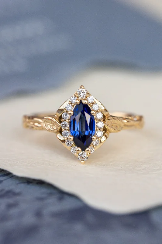 Men's Tanzanite Engagement Rings in Palladium with a Three - Stone ArrangementDark blue lab sapphire engagement ring, gold proposal ring with marquise cut gemstone and diamond halo / Florentina