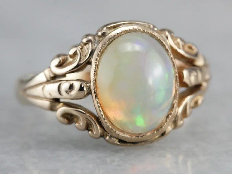 Aquamarine Gemstone Rings in 9K Gold with a Bezel Setting for a Modern and Secure FitAntique Opal Ornate Gold Ring Aquamarine Gemstone Rings in 9K Gold with a Bezel Setting for a Modern and Secure FitAntique Opal Ornate Gold Ring