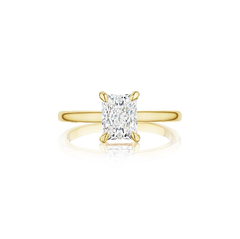 Men's Tanzanite Engagement Rings in Palladium with a Three - Stone ArrangementFink's Exclusive Radiant Cut Diamond Solitaire Ring in Yellow Gold