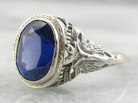 Amethyst Gemstone Rings in Sterling Silver with a Halo of Cubic Zirconia for a Budget - Friendly LuxuryCornflower Blue Ceylon Sapphire in an Antique Filigree Mounting