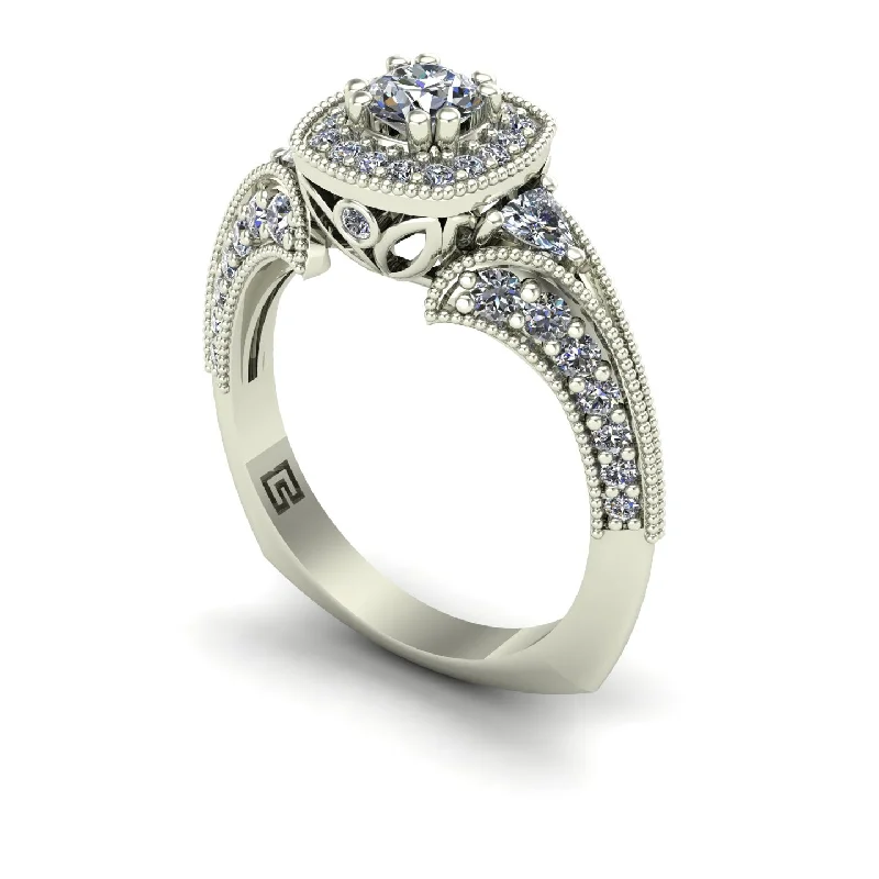 Men's Moonstone Engagement Rings in Silver - Plated Copper with a Celtic Knot PatternDiamond halo engagement ring with trillions and split shank in 14k white gold