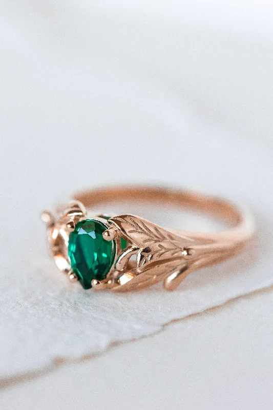 Men's Peridot Engagement Rings in 14K Gold - Filled Metal with a Micro - Pave SettingREADY TO SHIP: Wisteria engagement ring with pear cut lab emerald in 14K rose gold, AVAILABLE RING SIZES: 3.75 - 6.75 US