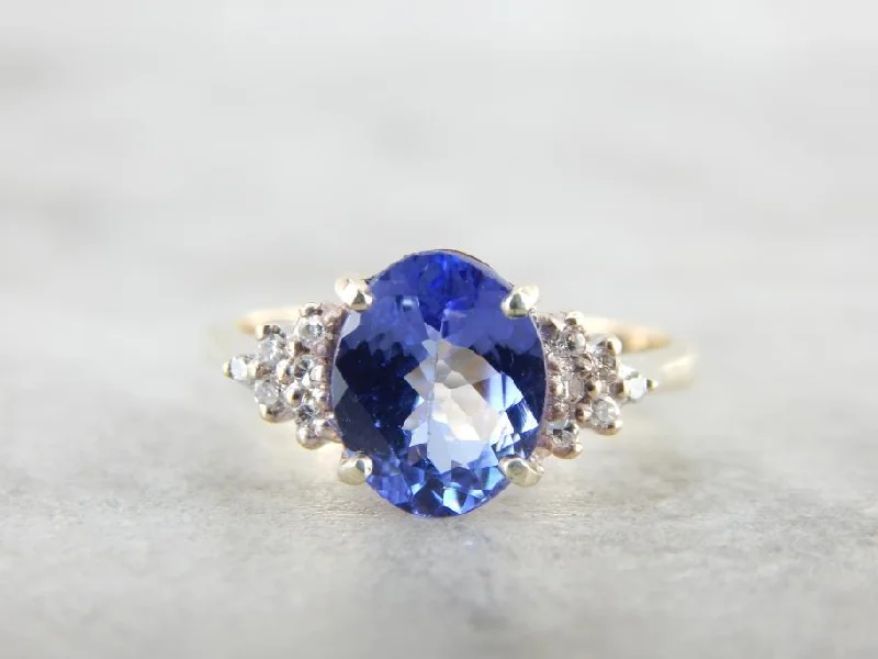 Peridot Gemstone Rings in 14K Gold - Filled Metal with a Pave - Set Band for a Sparkling LookTraditional Cocktail Ring with Refined Tanzanite Centerpiece Peridot Gemstone Rings in 14K Gold - Filled Metal with a Pave - Set Band for a Sparkling LookTraditional Cocktail Ring with Refined Tanzanite Centerpiece