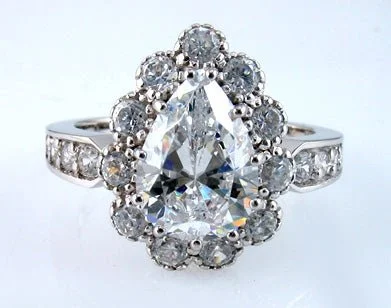 Men's Topaz Engagement Rings in 10K Gold with a Channel - Set Diamond BandPear Cut Cubic Zirconia Halo Engagement Ring in White Gold Plated Sterling Silver