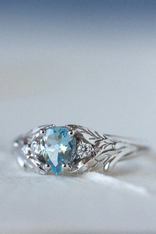 Men's Tanzanite Engagement Rings in Palladium with a Three - Stone ArrangementREADY TO SHIP: Wisteria ring in 14K white gold, natural aquamarine pear cut 7x5 mm, accent moissanites, AVAILABLE RING SIZES: 6.5 - 9.5 US