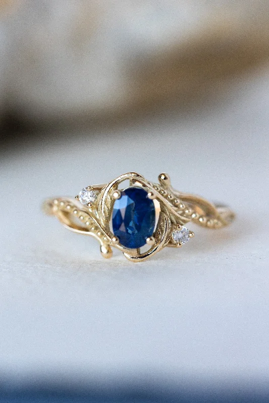 Men's Citrine Engagement Rings in Stainless Steel with a Stackable Band DesignREADY TO SHIP: Undina ring in 14K yellow gold, natural blue sapphire oval cut 7x5 mm, accent moissanites, AVAILABLE RING SIZES: 5.25 - 8.25 US