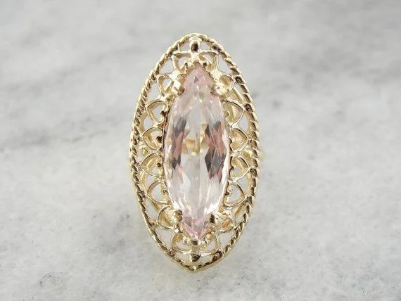 Tanzanite Gemstone Rings in 10K Gold with a Trilogy Design for a Sophisticated GiftLarge Marquise Morganite Gem in Filigree Gold Cocktail Ring Tanzanite Gemstone Rings in 10K Gold with a Trilogy Design for a Sophisticated GiftLarge Marquise Morganite Gem in Filigree Gold Cocktail Ring