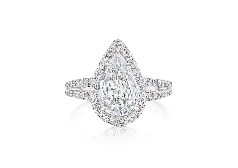 Men's Ruby Engagement Rings in Rose Gold with a Solitaire Design for a Romantic GestureFink's Exclusive Platinum Pear Diamond Split Shank Engagement Ring Men's Ruby Engagement Rings in Rose Gold with a Solitaire Design for a Romantic GestureFink's Exclusive Platinum Pear Diamond Split Shank Engagement Ring