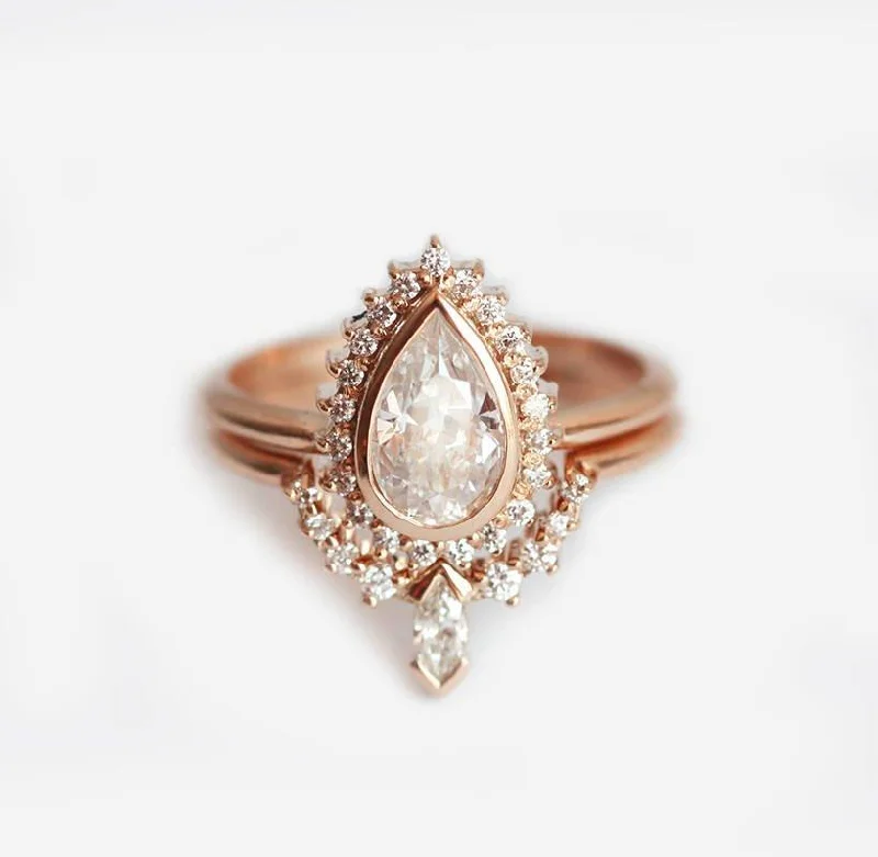 Emerald - Cut Gemstone Wedding Bands in 18K Gold for a Luxurious and Statement - Making PieceBridal Set: Pear Diamond Ring with Halo & Diamond Crown Band Emerald - Cut Gemstone Wedding Bands in 18K Gold for a Luxurious and Statement - Making PieceBridal Set: Pear Diamond Ring with Halo & Diamond Crown Band