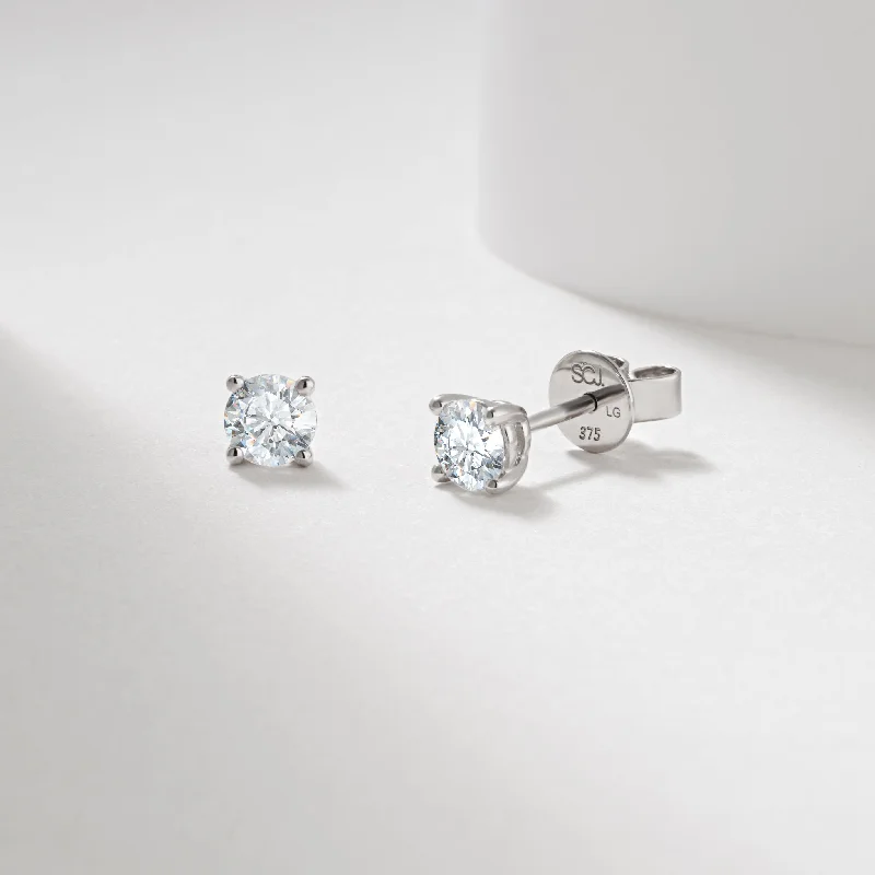 Pearl - and - Diamond - Studded Wedding Bands in White Gold for a Feminine and Elegant Touch9K Yellow Gold Round Brilliant Lab Diamond Stud Earrings 0.60tdw