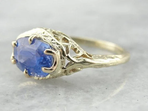 Iolite Gemstone Rings in 10K Gold with a Twisted Band for a Distinctive and Stylish AccessoryAntique Green Gold Filigree and Rare Ceylon Sapphire Ring Iolite Gemstone Rings in 10K Gold with a Twisted Band for a Distinctive and Stylish AccessoryAntique Green Gold Filigree and Rare Ceylon Sapphire Ring